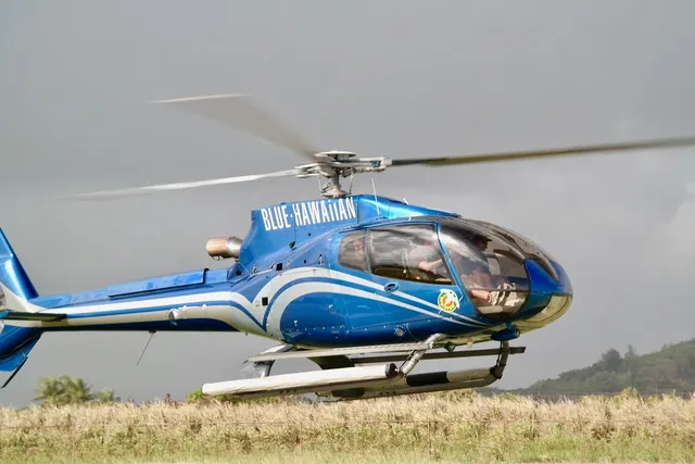 a helicopter landing pad next to the ocean