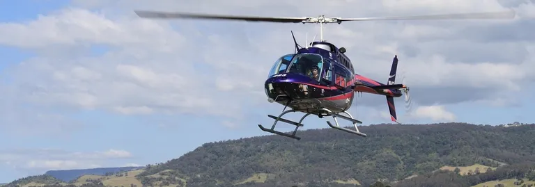 A helicopter landing pad next to the ocean to represent a landing page