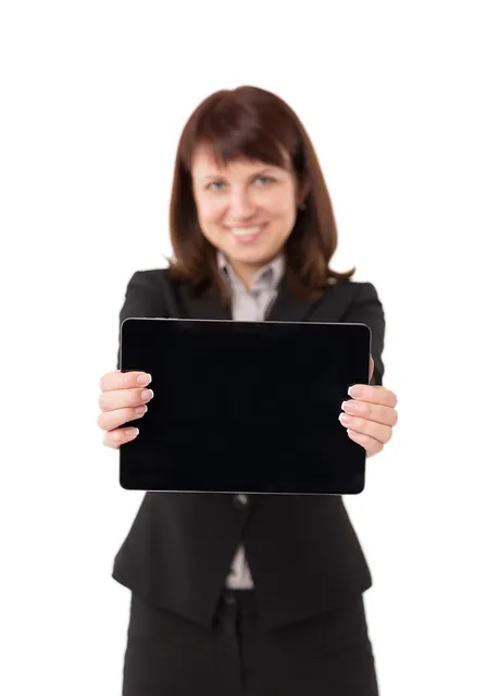 a tablet with analytic data sits on top of printed analytic data
