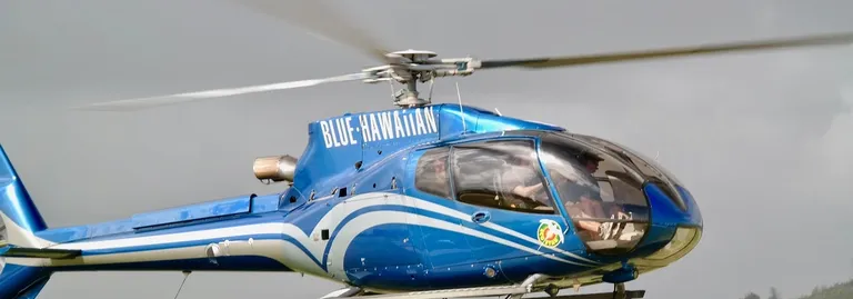 a helicopter landing pad next to the ocean
