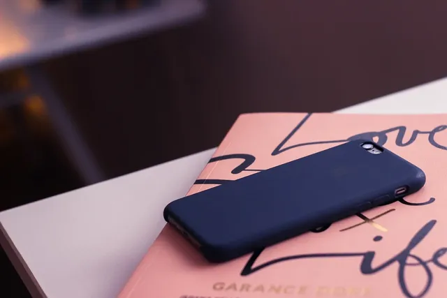 Closeup of a booking calendar and a mobile phone