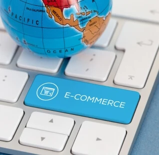 A large e-commerce button on a laptop keyboard