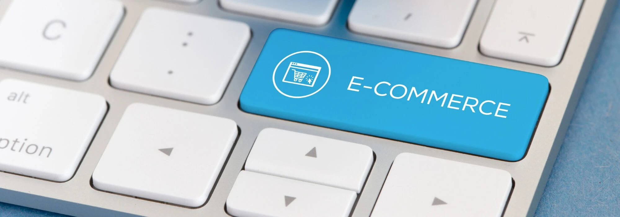 A large e-commerce button on a laptop keyboard